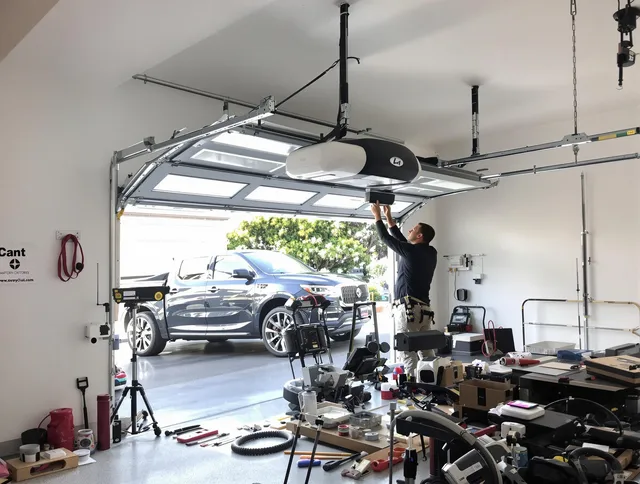 Seekonk Garage Door Repair specialist installing smart garage door opener system in Seekonk home