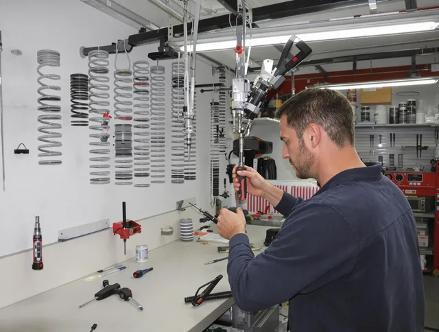 Seekonk Garage Door Repair safety certified technician performing precision spring replacement in Seekonk