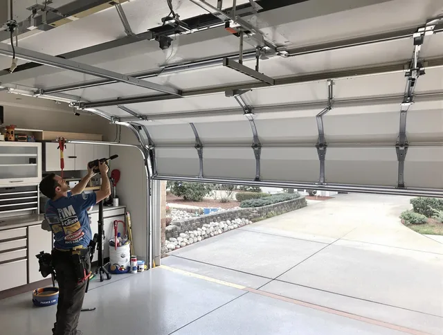 Garage door track repair service by Seekonk Garage Door Repair in Seekonk